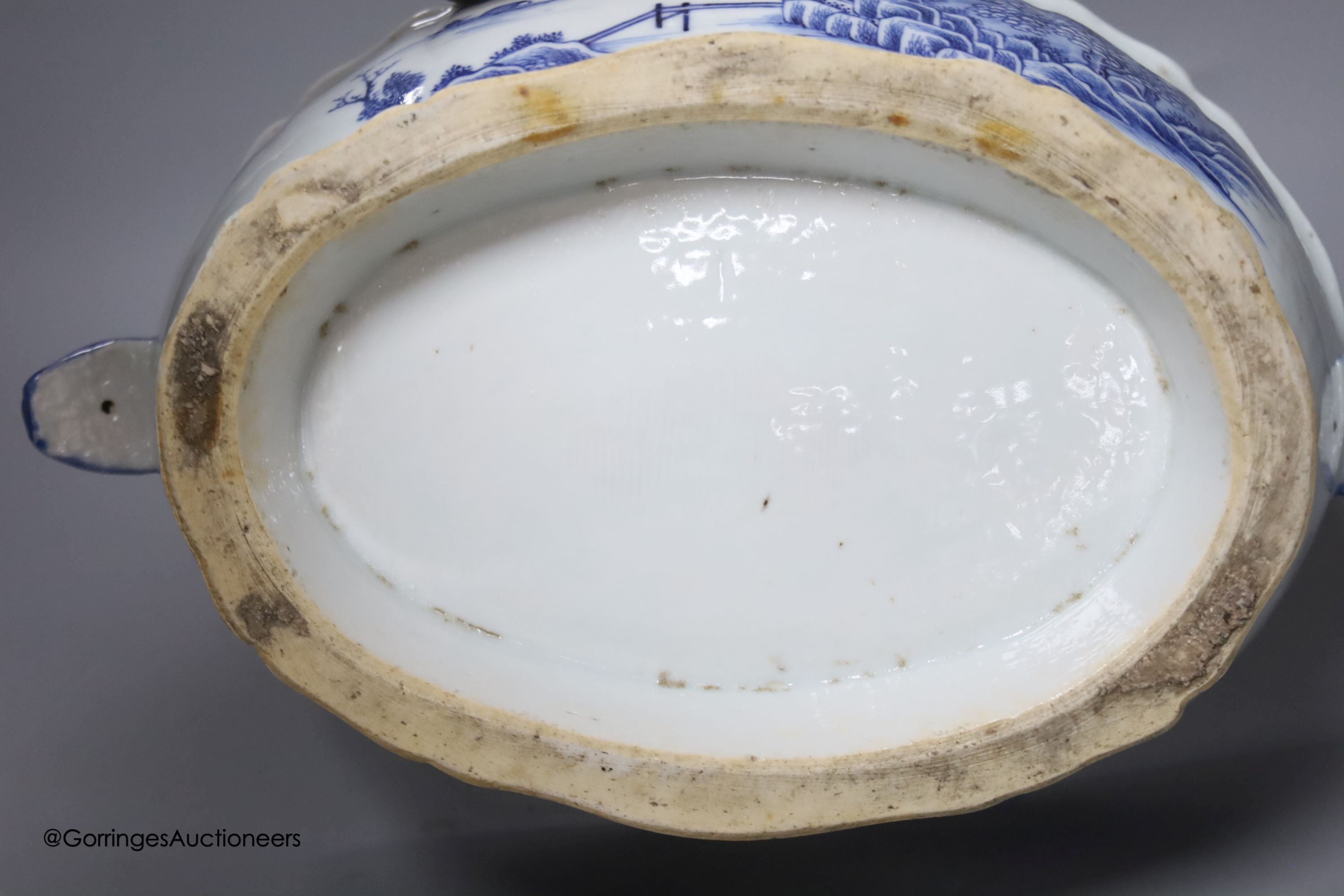 A 18th century Chinese export blue and white tureen and cover pomegranate finial, length 35cm